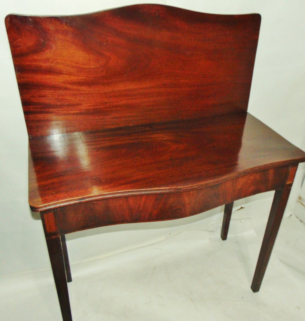 Georgian mahogany serpentine tea table circa 1790 View V