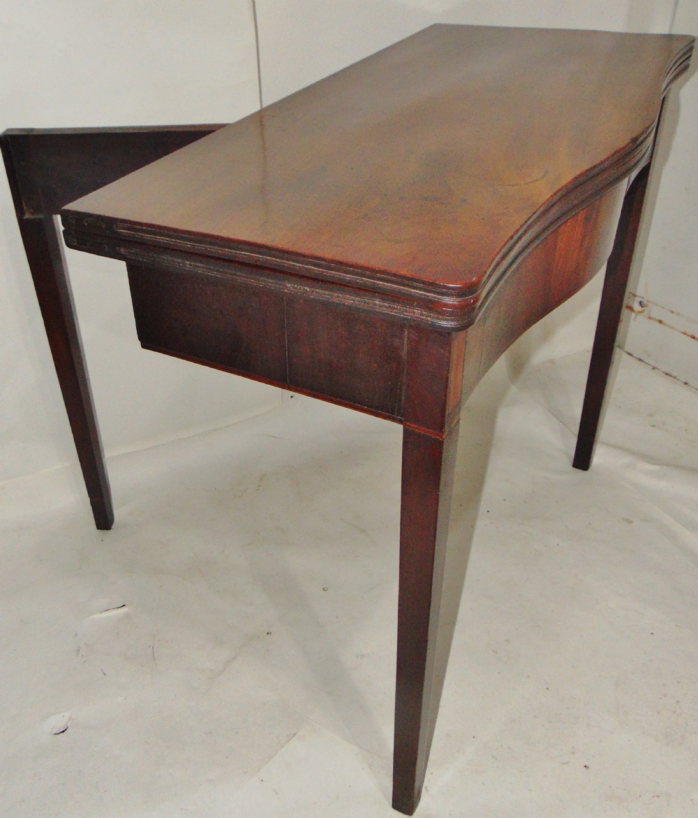Georgian mahogany serpentine tea table circa 1790 View VI