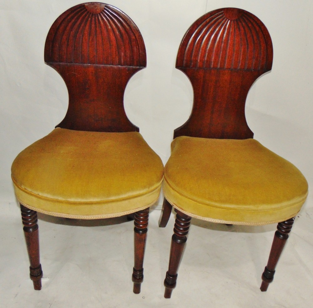 Pair Georgian mahogany hall chairs circa 1810