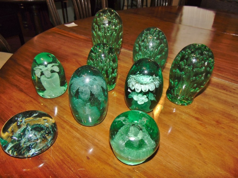 Collection of 9 Sutherland dump weights circa 1870