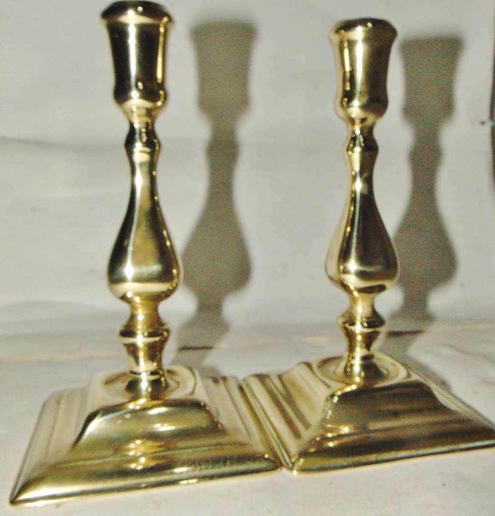 Pair Queen Anne brass candlesticks circa 1710