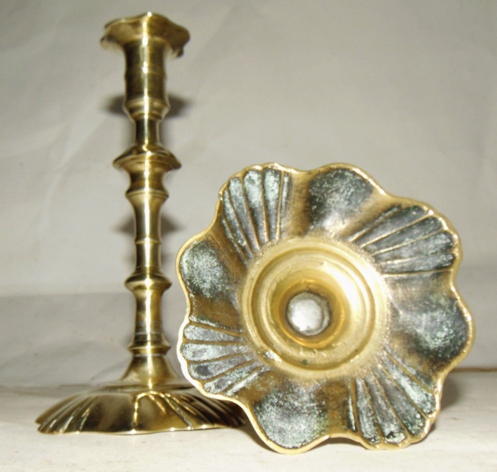 Pair petal based brass candlesticks circa 1745
