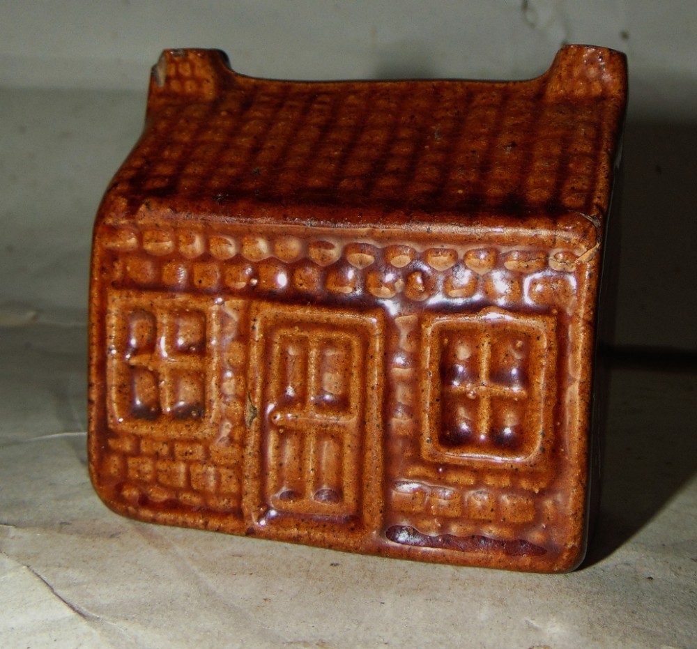 Victorian treacle glazed cottage money box circa 1870