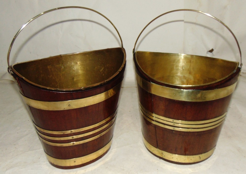 Near pair Georgian mahogany brass bound buckets circa 1790