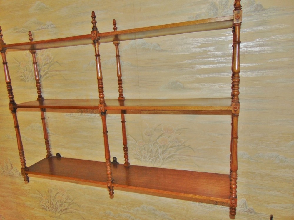 Regency fruitwood hanging shelves circa 1825