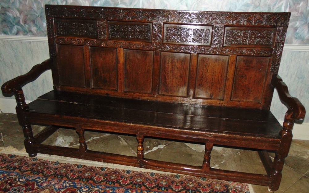Rare early oak carved paneled settle circa 1690