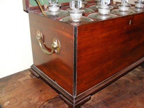 fig 1. A Georgian Mahogany Spirit Decanter Set.