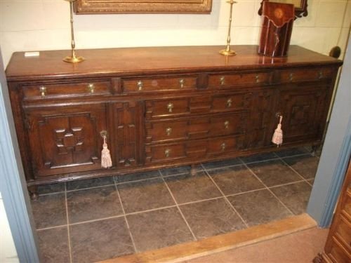 A Georgian Oak Geometrically Moulded Dresser Base.