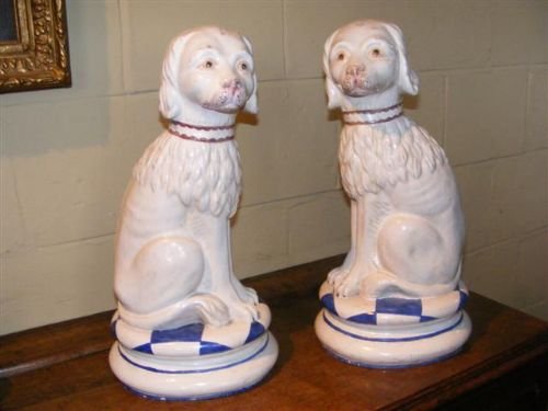 Pair 19th Continental Faience Dogs