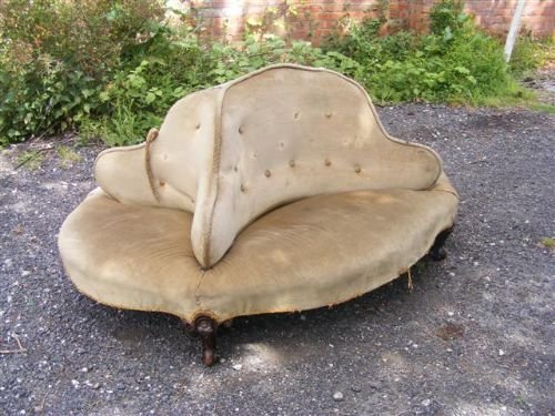 A Victorian Love/conversation Settee.