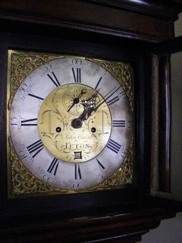 fig 1. Brass faced Oak Longcase clock by John Cain Luton.