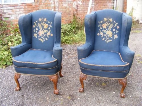 A Beautifull Pair of Walnut Wing Armchairs.