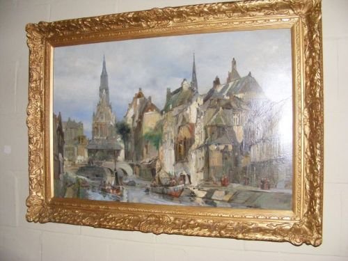 fig 1. An oil painting on canvas depicting a historic European canal cityscape with a church spire, set inside an ornate carved gilt frame.