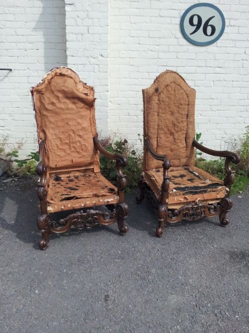 A Suprerb Pair of Walnut Framed Hall Arm Chairs.
