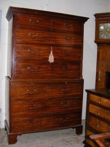 A Superb Mahogany Georgian Chest on Chest with Brushing Slide