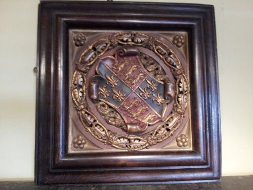 A Fine Early 19th Century Carved and Polychromed Armorial Plaque Enriched with Gilding.