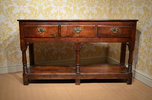 fig 1. A Wonderful Small Georgian Oak Dresser Base with a Potboard Shelf Below.