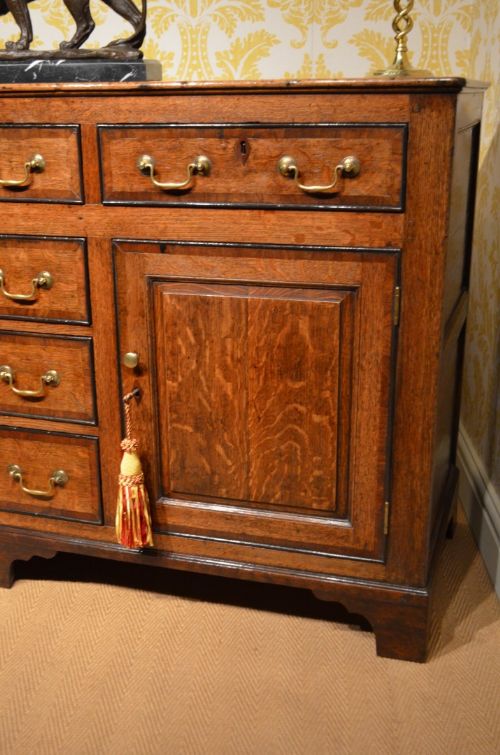 fig 1. 18th Century Oak Cupboard Dresser Base with mahogany crossbanding and ebonised cockbeading