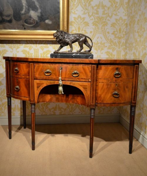 A Regency Mahogany Veneered Breakfront Sideboard.