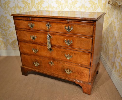 fig 1. Early 18th Century Walnut Bachelor Chest with a slide.