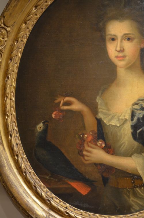fig 1. 18th Century English School Oval Portrait of A Young Lady and a Parrot