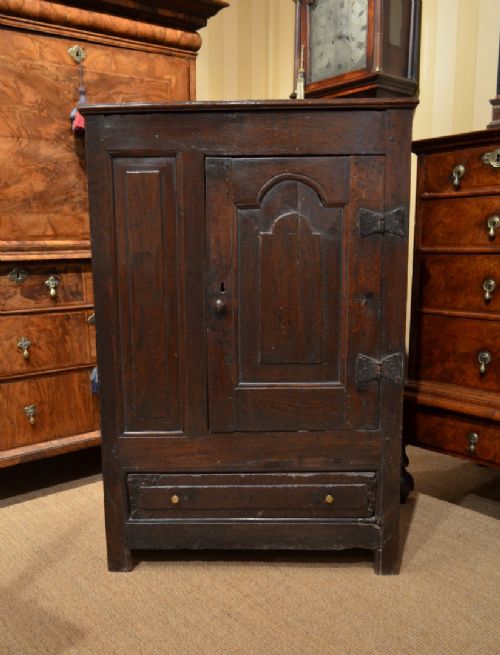 fig 1. Fabulous 17th Century Oak Pannelled Cupboard with arch door with wonderful colour and patination