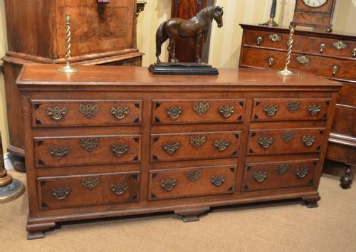 A Very Impressive Oak Dresser Base with Nine Drawers.