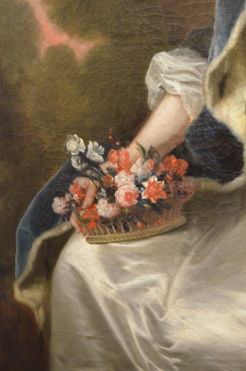 fig 2. An 18th-century oil painting on canvas depicting a seated woman in a light gown with a dark blue mantle, set within a carved giltwood frame.