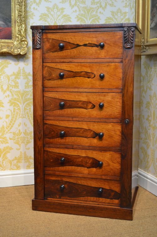 fig 1. A William IV Rosewood Wellington Chest.