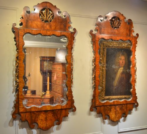 Pair of Walnut and Parcel Gilt Fretwork Mirror's. Early 19th Century.