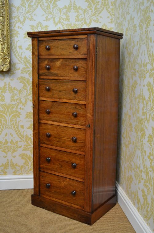 fig 1. A Beautiful Rosewood Wellington Chest of Drawers.