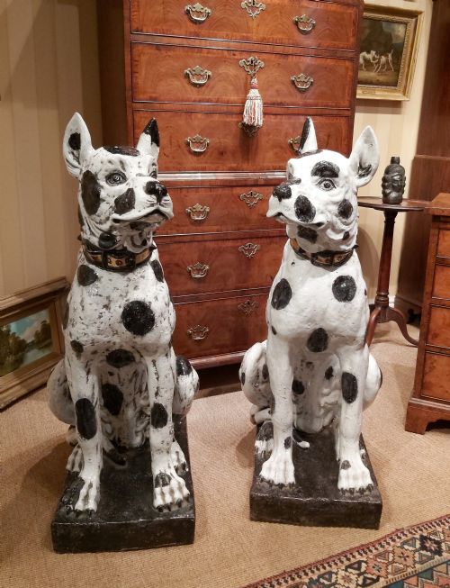 A Pair of Lifesize Pottery Glazed Dogs.