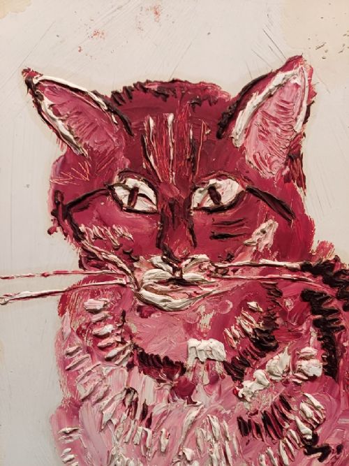 fig 1. An impasto oil painting on board depicting a red patterned cat sitting upright, housed in a simple light wood frame.