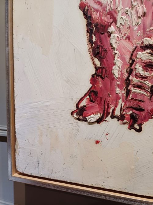 fig 2. An impasto oil painting on board depicting a red patterned cat sitting upright, housed in a simple light wood frame.