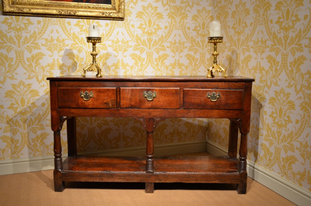 A Wonderful Small Georgian Oak Dresser Base with a Potboard Shelf  Below.