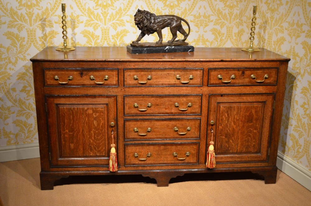 18th Century Oak Cupboard Dresser Base with mahogany crossbanding and ebonised cockbeading