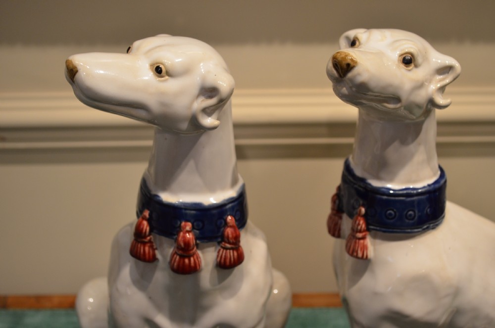 A Stunning Pair of French Faience Dogs. View IV