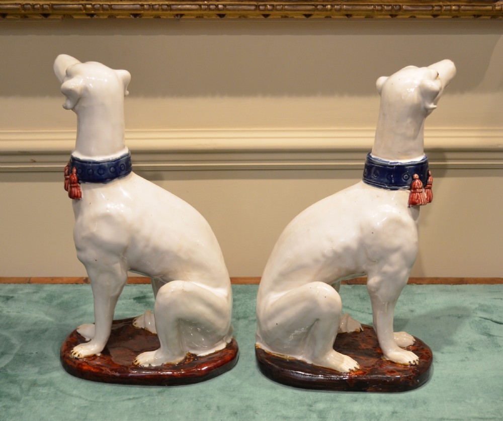 A Stunning Pair of French Faience Dogs. View X