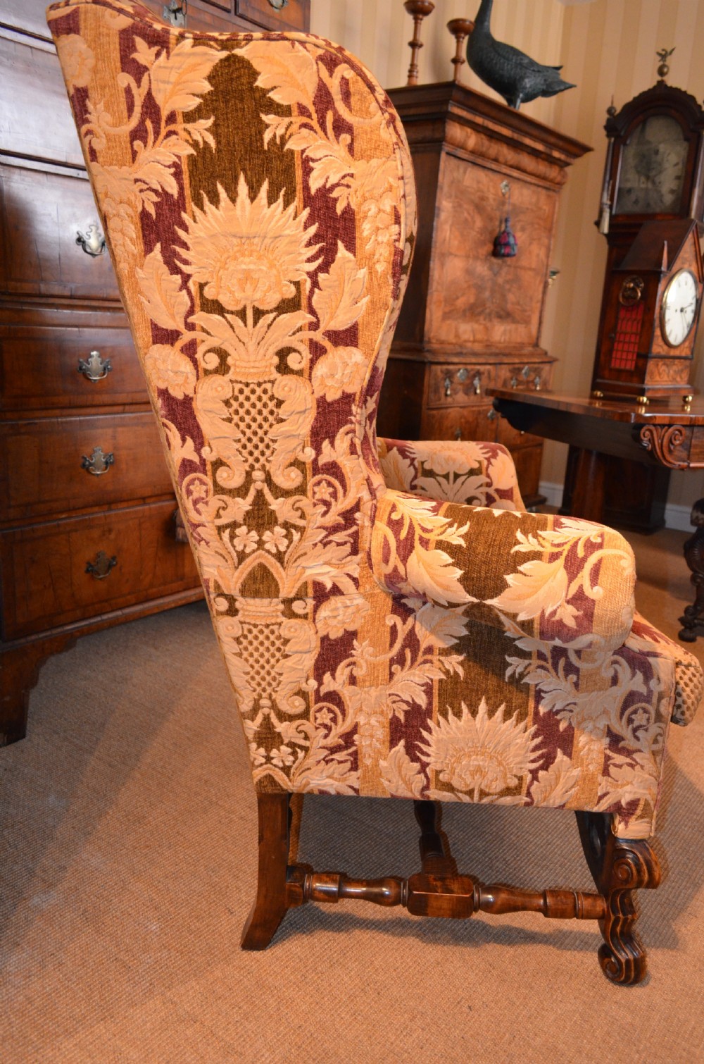 Fabulous Late 19th Century Wing Armchair with decorative carved stretchers C1890 View II