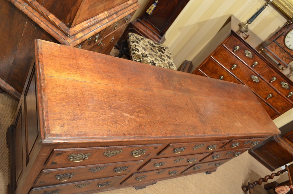 A Very Impressive Oak Dresser Base with nine drawers. View XIII
