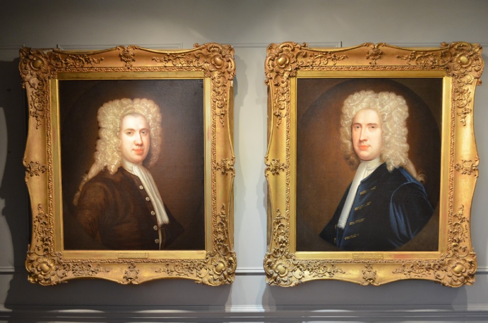 Pair Of Early 18th Century Oil Portrait Paintings In Original Gilt Carved Frames.