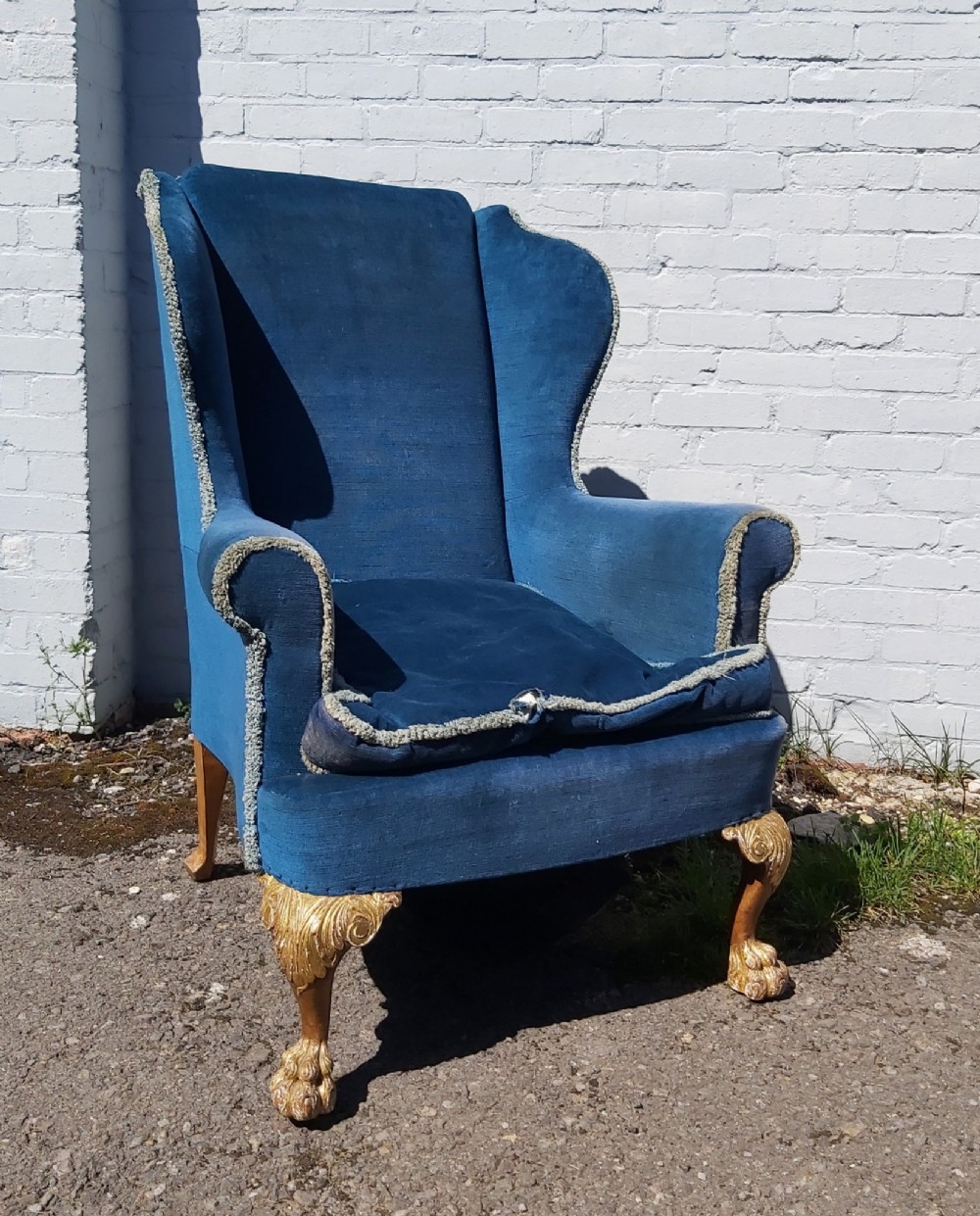 19th Century Walnut and gilded cabriole leg Wing Armchair.