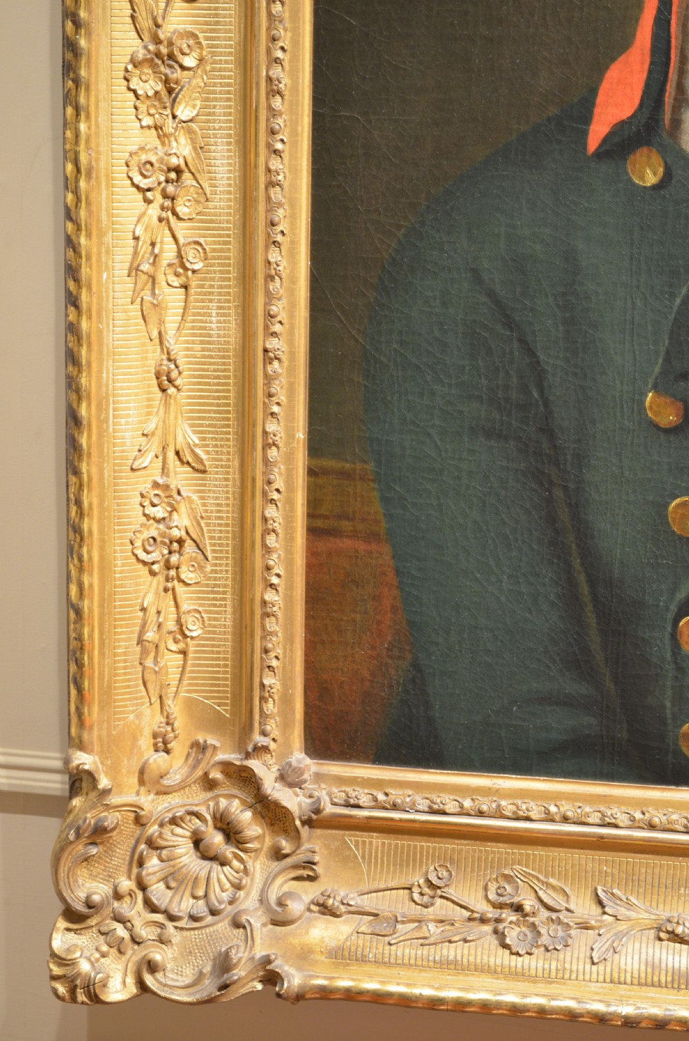 An antique oil painting depicting a Russian military officer in a dark uniform jacket set within an ornate gilded frame. View VII
