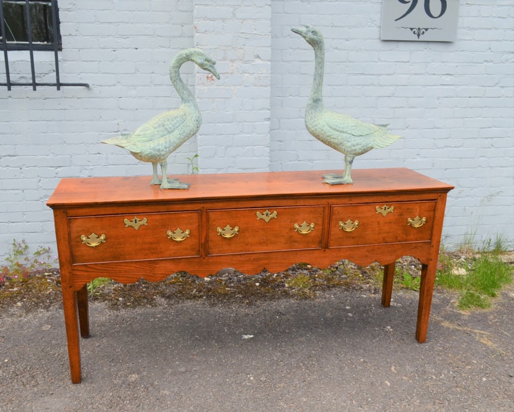 A Rare Late Georgian Elm Three Drawer Antique Dresser Base.