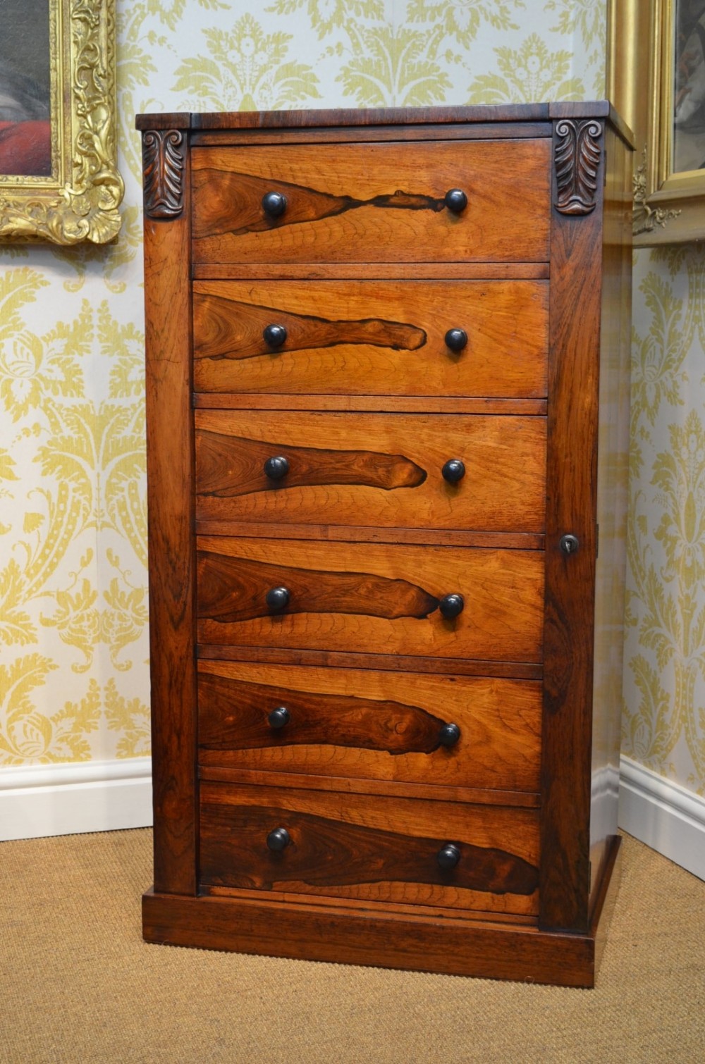 A William IV Rosewood Wellington Chest.