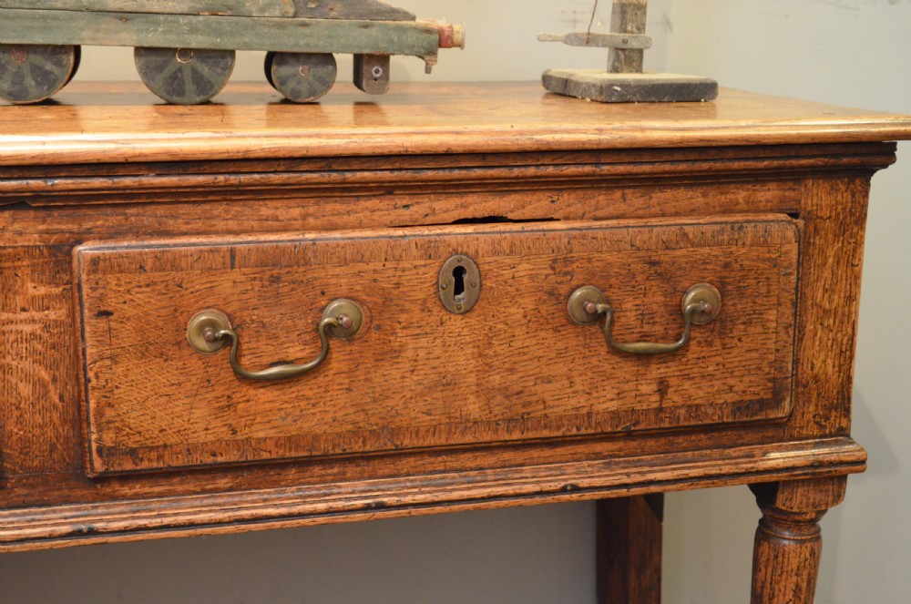 Small Georgian Padfoot Oak Dresser Base. View IV