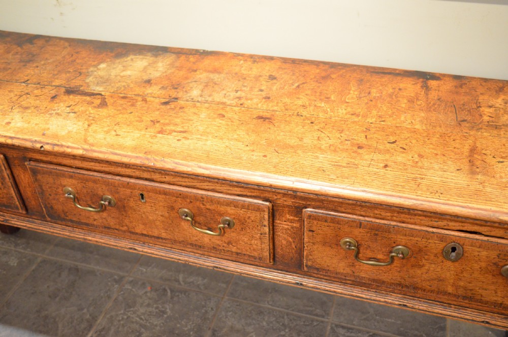 Small Georgian Padfoot Oak Dresser Base. View XII