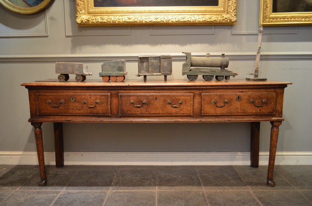 Small Georgian Padfoot Oak Dresser Base. View XIX