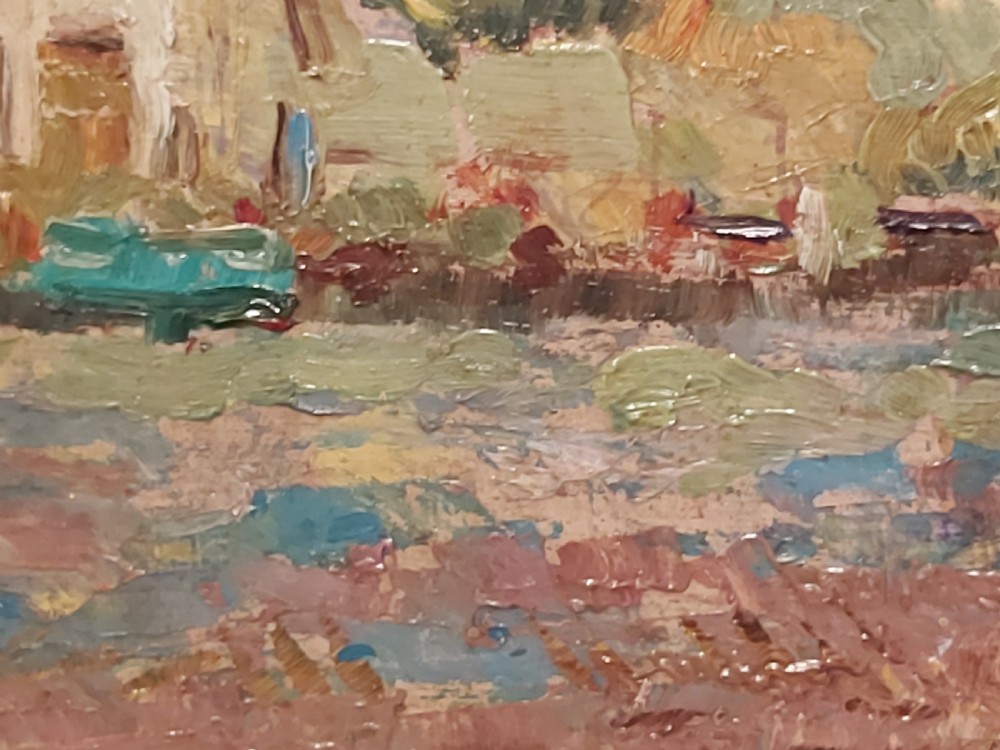 A framed impressionist landscape oil painting depicting a rural church, surrounding village buildings, lavender fields, and a dirt path. View III