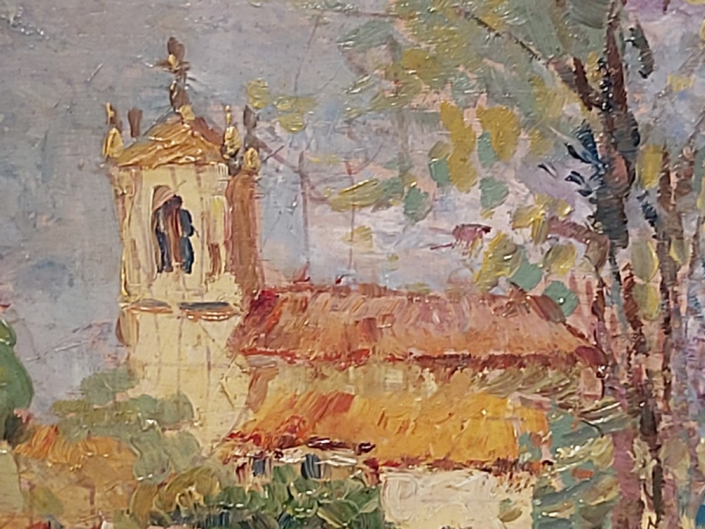 A framed impressionist landscape oil painting depicting a rural church, surrounding village buildings, lavender fields, and a dirt path. View IV